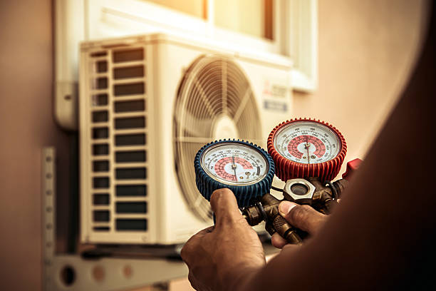 Professional Ductwork Repair technician working in Pinehurst, MA